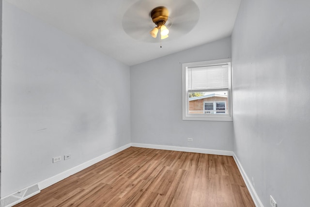 2059 Pine St Unit D, Des Plaines, IL 60018 - spare room with light wood-style floors, ceiling fan, and vaulted ceiling