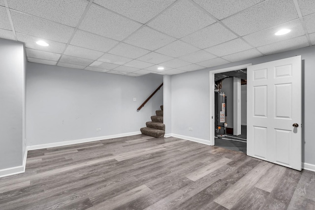 2059 Pine St Unit D, Des Plaines, IL 60018 - finished basement with gas water heater, stairs, wood finished floors, recessed lighting, and a drop ceiling