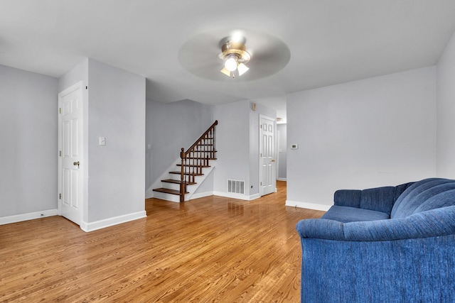 2059 Pine St Unit D, Des Plaines, IL 60018 - sitting room featuring stairway, light wood finished floors, and ceiling fan