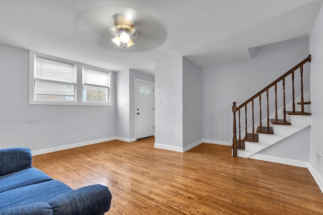 2059 Pine St Unit D, Des Plaines, IL 60018 - living room featuring ceiling fan, wood finished floors, and stairs