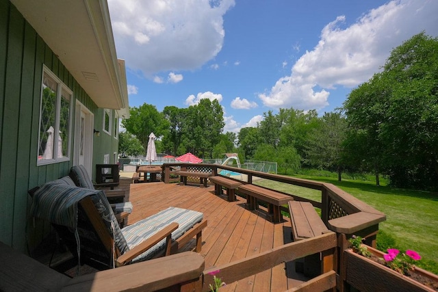 10S125 Springbrook Dr, Naperville, IL 60565 - wooden terrace with outdoor dining space, a lawn, and view of wooded area
