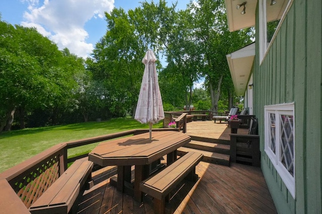 10S125 Springbrook Dr, Naperville, IL 60565 - deck featuring outdoor dining space, a lawn, and view of scattered trees