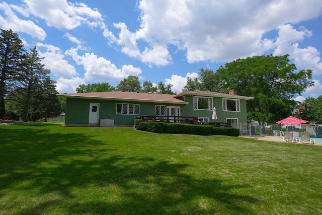 10S125 Springbrook Dr, Naperville, IL 60565 - rear view of house with a chimney and a patio area