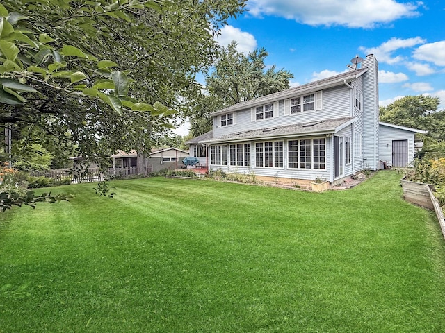 1607 Parkside Ct, Freeport, IL 61032 - rear view of property with a chimney and a sunroom
