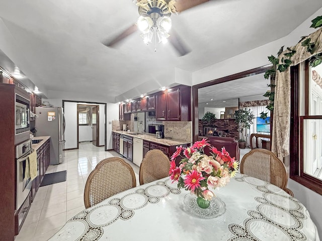 1607 Parkside Ct, Freeport, IL 61032 - dining space featuring a ceiling fan and light tile patterned floors