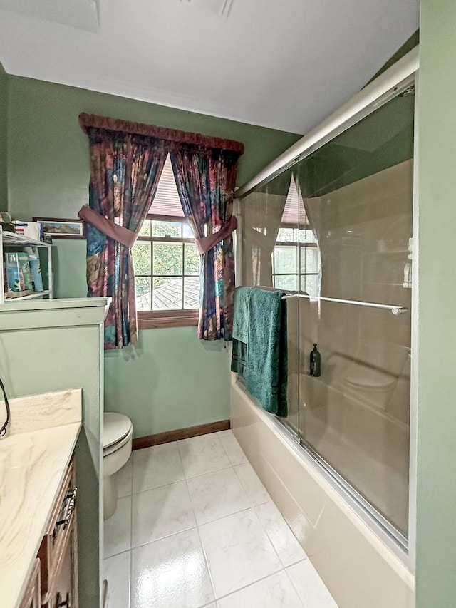 1607 Parkside Ct, Freeport, IL 61032 - bathroom with vanity, shower / bath combination with glass door, and plenty of natural light