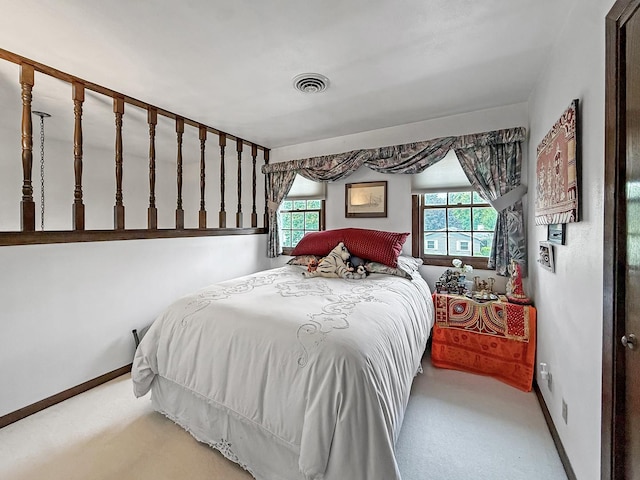 1607 Parkside Ct, Freeport, IL 61032 - carpeted bedroom featuring multiple windows