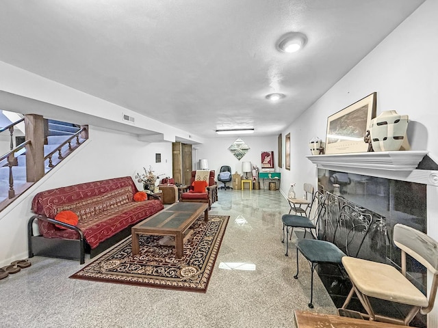 1607 Parkside Ct, Freeport, IL 61032 - living area featuring a tile fireplace and stairs