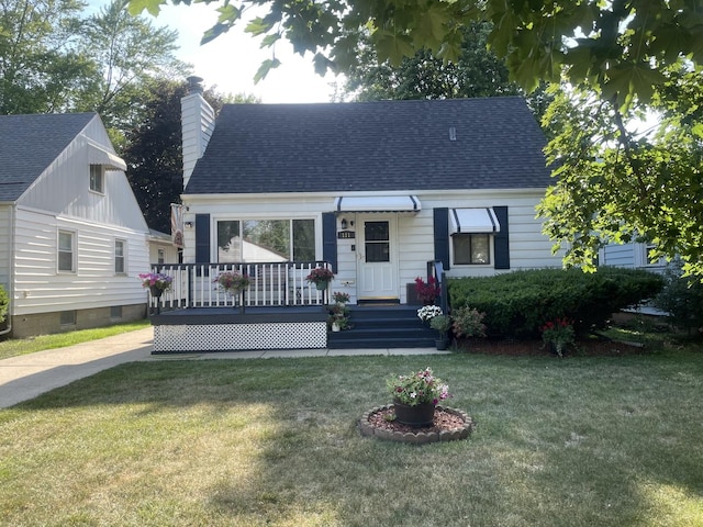 111 Earl Ave, Joliet, IL 60436 - view of front facade featuring a chimney, a front lawn, and roof with shingles