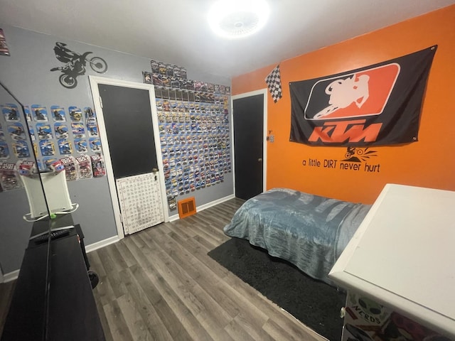 111 Earl Ave, Joliet, IL 60436 - bedroom featuring wood finished floors and baseboards