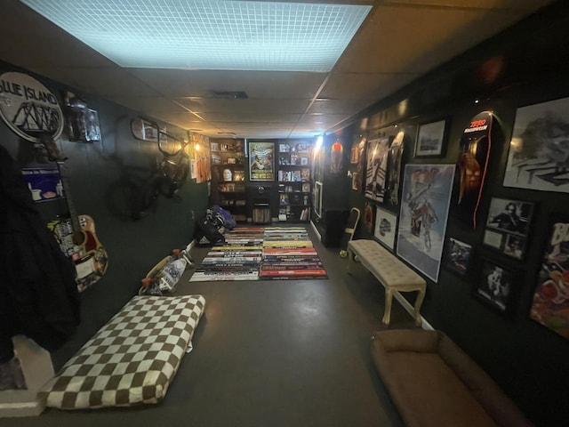 111 Earl Ave, Joliet, IL 60436 - rec room featuring a drop ceiling and concrete floors
