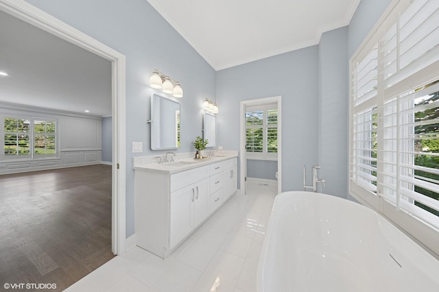 1604 Burr Ridge Clb, Burr Ridge, IL 60527 - bathroom featuring ornamental molding, a soaking tub, and double vanity