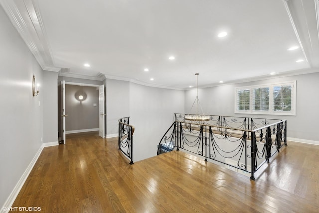 1604 Burr Ridge Clb, Burr Ridge, IL 60527 - hall featuring an upstairs landing, crown molding, recessed lighting, wood finished floors, and a chandelier