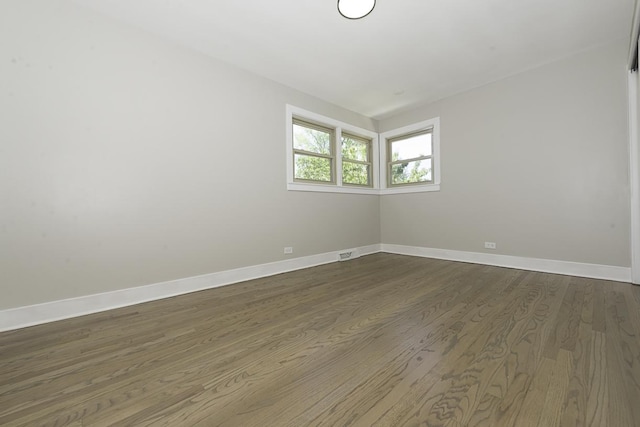 5848 N Drake Ave, Chicago, IL 60659 - unfurnished room featuring dark wood-type flooring