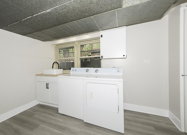 5848 N Drake Ave, Chicago, IL 60659 - laundry area with independent washer and dryer and wood finished floors