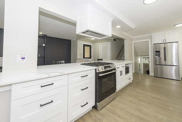 5848 N Drake Ave, Chicago, IL 60659 - kitchen featuring appliances with stainless steel finishes, light wood-type flooring, white cabinets, light stone counters, and recessed lighting