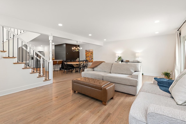 8378 Dunmore Dr, Tinley Park, IL 60487 - living area with light wood-type flooring, stairway, recessed lighting, and decorative columns