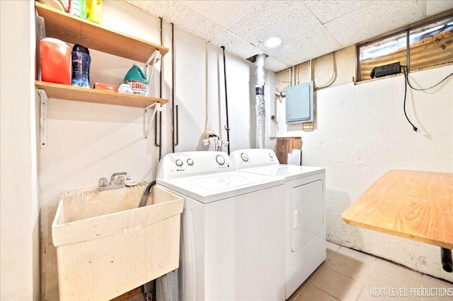 1885 Monday Dr, Elgin, IL 60123 - laundry room featuring separate washer and dryer, electric panel, and light tile patterned floors