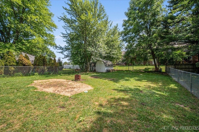 1885 Monday Dr, Elgin, IL 60123 - fenced backyard featuring a storage unit