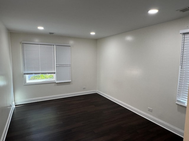 19W286 Governors Trl Unit 0, Oak Brook, IL 60523 - unfurnished room with dark wood-type flooring and recessed lighting