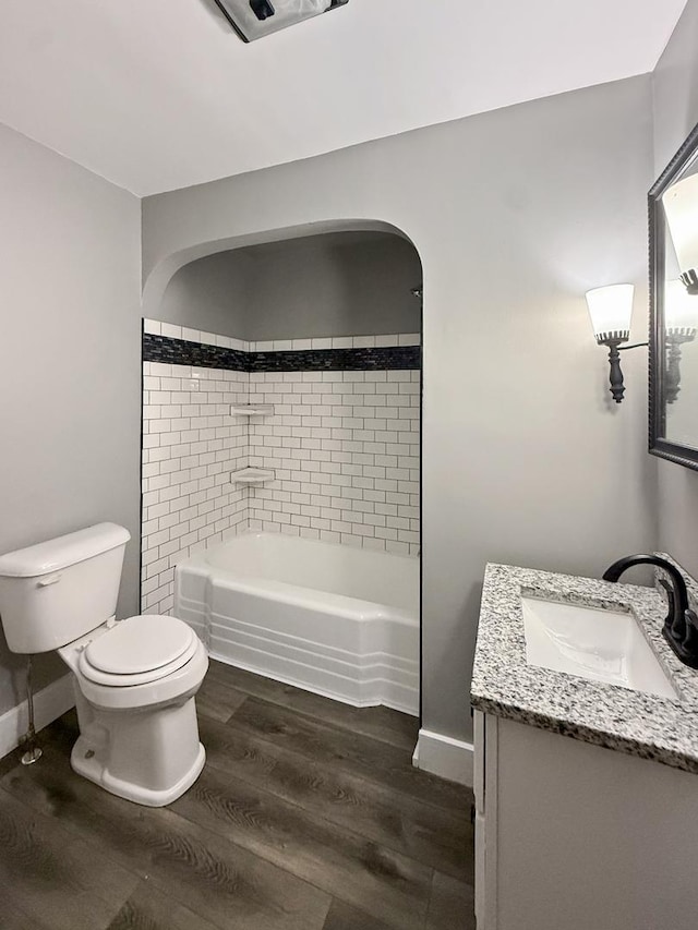 309 W S St, Pearl City, IL 61062 - full bath featuring vanity, wood finished floors, and tub / shower combination