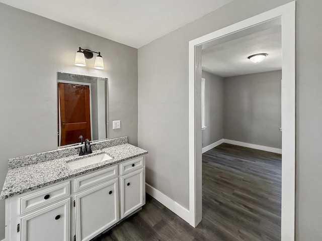 309 W S St, Pearl City, IL 61062 - bathroom featuring wood finished floors and vanity