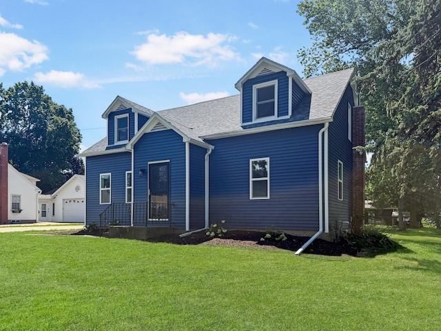 309 W S St, Pearl City, IL 61062 - view of front of home featuring a front yard and roof with shingles