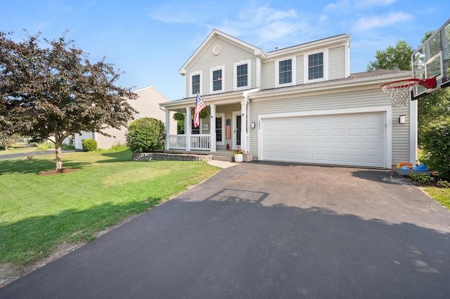 203 Stearn Dr, Genoa, IL 60135 - traditional-style home with a porch, driveway, a front yard, and an attached garage