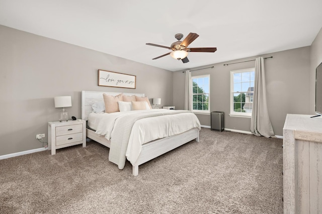 203 Stearn Dr, Genoa, IL 60135 - carpeted bedroom featuring baseboards and ceiling fan