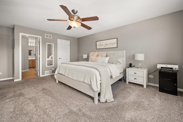 203 Stearn Dr, Genoa, IL 60135 - carpeted bedroom featuring connected bathroom and a ceiling fan