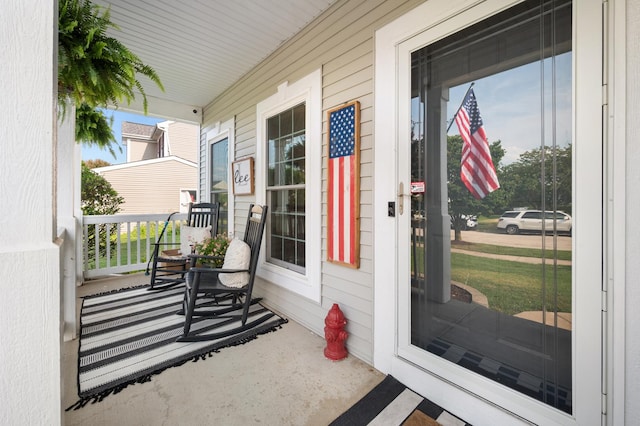 203 Stearn Dr, Genoa, IL 60135 - view of exterior entry featuring covered porch