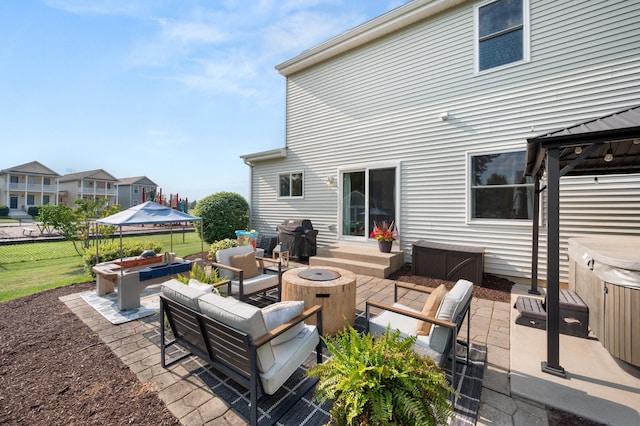 203 Stearn Dr, Genoa, IL 60135 - view of patio / terrace featuring an outdoor living space with a fire pit, a hot tub, a grill, and a gazebo
