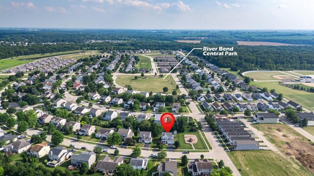 203 Stearn Dr, Genoa, IL 60135 - aerial overview of property's location featuring nearby suburban area
