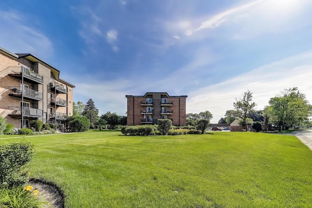 1227 S Old Wilke Rd Unit 304, Arlington Heights, IL 60005 - view of property's community featuring a lawn