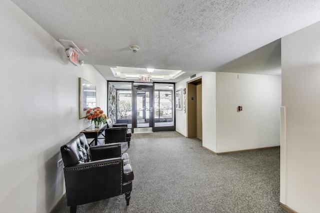 1227 S Old Wilke Rd Unit 304, Arlington Heights, IL 60005 - lobby featuring a textured ceiling