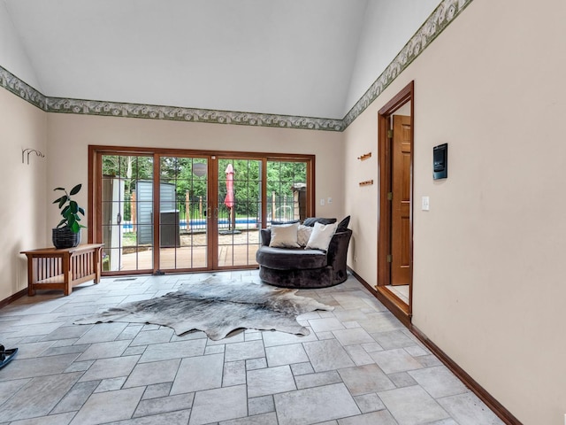 231 Deer Ln, Sleepy Hollow, IL 60118 - living area featuring high vaulted ceiling, french doors, and light stone finish floors