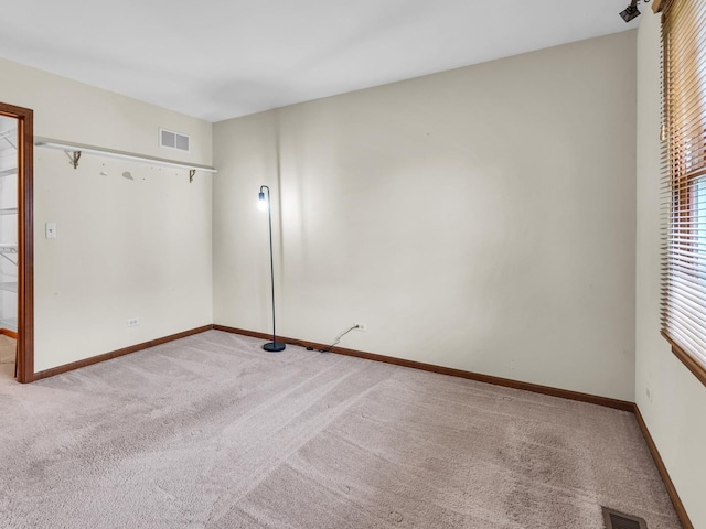 231 Deer Ln, Sleepy Hollow, IL 60118 - empty room featuring light carpet