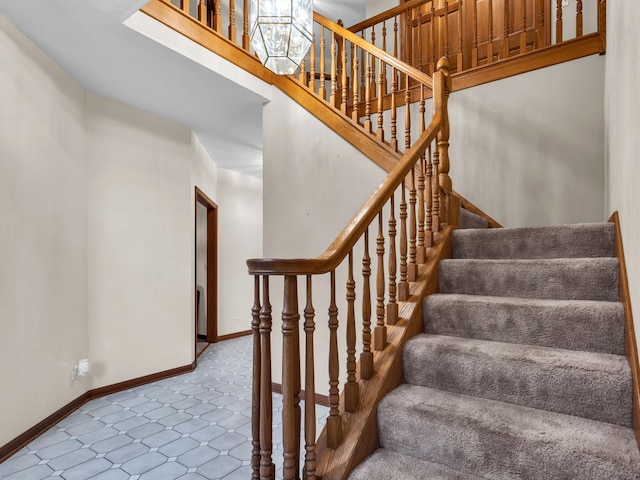 231 Deer Ln, Sleepy Hollow, IL 60118 - staircase featuring baseboards and tile patterned flooring