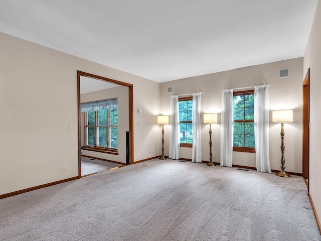 231 Deer Ln, Sleepy Hollow, IL 60118 - unfurnished room featuring carpet flooring and baseboards