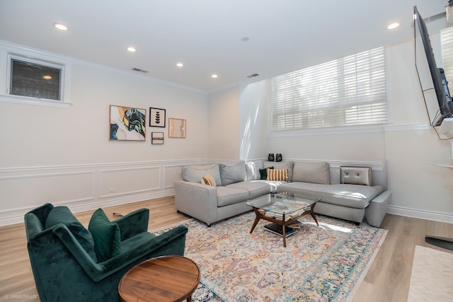 2418 N Southport Ave Unit 1, Chicago, IL 60614 - living room with crown molding, light wood-style floors, recessed lighting, and wainscoting