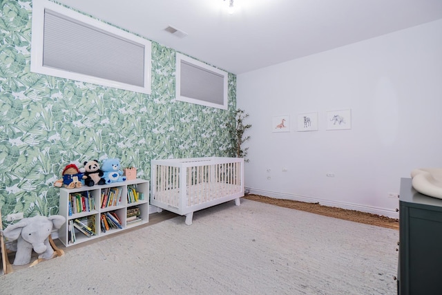 2418 N Southport Ave Unit 1, Chicago, IL 60614 - bedroom featuring wallpapered walls and baseboards