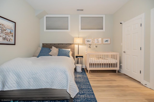 2418 N Southport Ave Unit 1, Chicago, IL 60614 - bedroom featuring wood finished floors