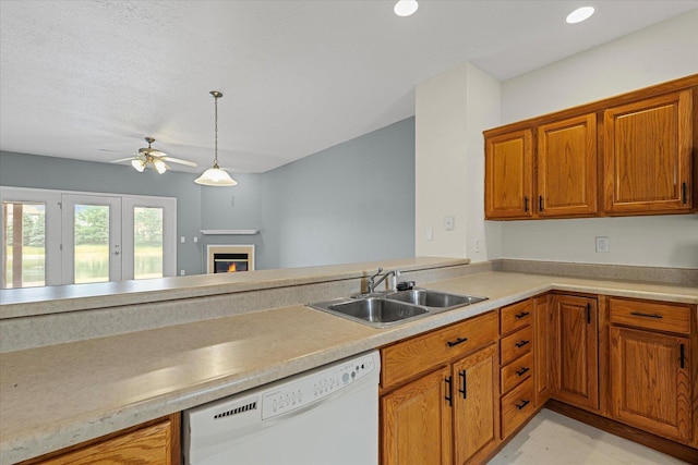 3718 Thornhill Dr Unit 0, Champaign, IL 61822 - kitchen with dishwasher, brown cabinets, light countertops, a ceiling fan, and recessed lighting