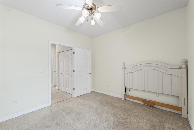 3718 Thornhill Dr Unit 0, Champaign, IL 61822 - unfurnished bedroom featuring carpet floors and a ceiling fan