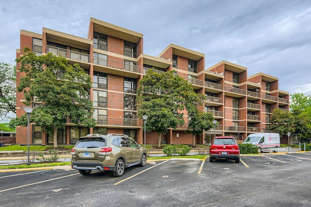 3041 S Michigan Ave Unit 501, Chicago, IL 60616 - view of apartment building / complex featuring uncovered parking