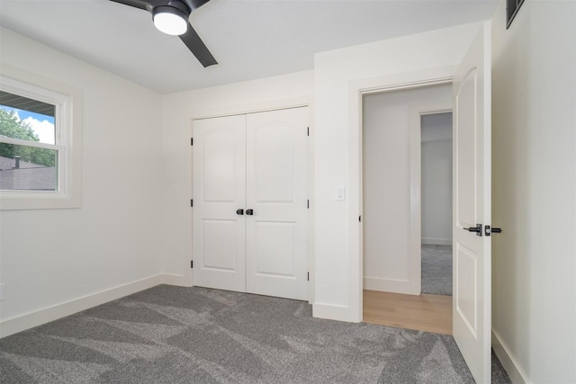 1717 Liston Ct, Normal, IL 61761 - unfurnished bedroom with carpet, a closet, and ceiling fan
