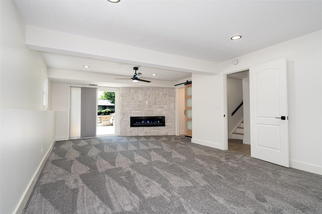 1717 Liston Ct, Normal, IL 61761 - unfurnished living room featuring carpet floors, ceiling fan, recessed lighting, a fireplace, and stairs