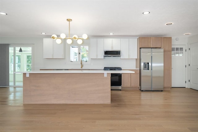 1717 Liston Ct, Normal, IL 61761 - kitchen featuring stainless steel appliances, healthy amount of natural light, recessed lighting, and light wood-style floors