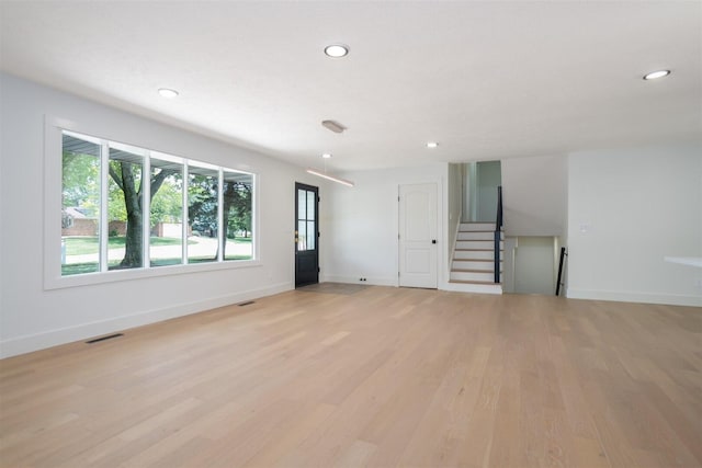 1717 Liston Ct, Normal, IL 61761 - spare room with light wood-type flooring, recessed lighting, and stairs