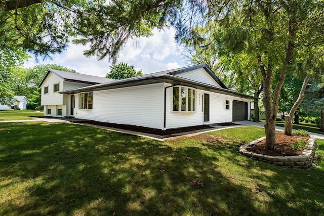 1717 Liston Ct, Normal, IL 61761 - view of front of house featuring a garage, a front lawn, and driveway